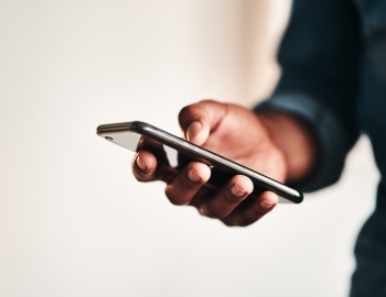 Person checking information on a phone